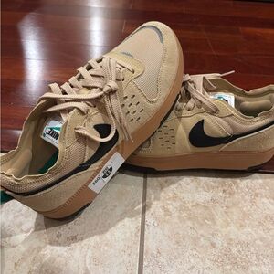 Nike Beige Sneakers with Black Logo